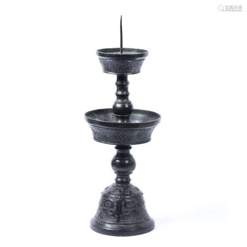 Bronze Ming style temple candlestick Chinese, 19th Century modelled as a ribbed and bulbous stem