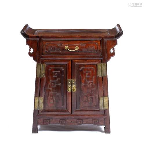 Hongmu altar cabinet Chinese, 19th/20th Century carved with a scroll top, with a single long