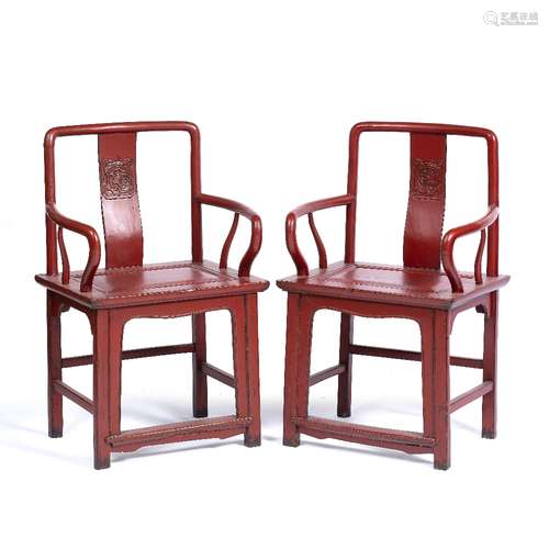 Pair of red lacquer southern official's hat chairs Chinese, Ming style each with a symbol to the