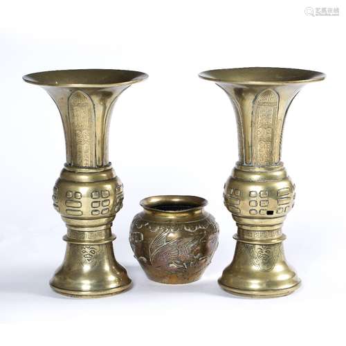 Pair of bronze Gu form vases Chinese, 19th Century decorated to the body with archaic symbols, the