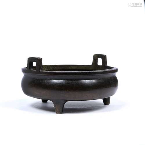 Bronze censer Chinese,18th/ 19th Century supported on three squat feet with two handles either side,