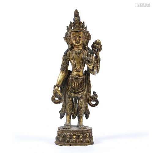 Gilt bronze figure of Amitayus Chinese, 17th/18th Century standing upon a double lotus base with one