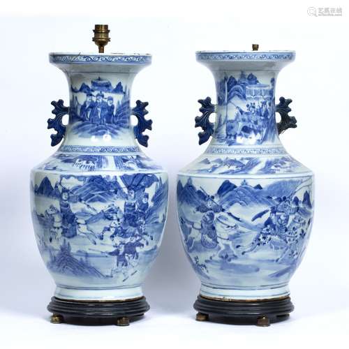 Pair of blue and white vases Chinese, 19th Century each painted with a battle scene around the