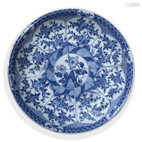 Blue and white charger Chinese, Kangxi (1662-1722) with central panel of peonies, and with further