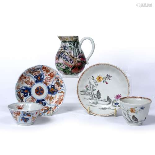 Two tea bowls, saucers and a cream jug Chinese, 19th Century one painted in monochrome and famille