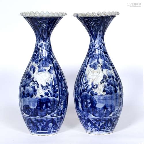 Pair of flared Imari blue and white vases Japanese, late 19th Century with raised herons on a