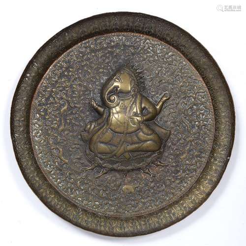 Brass offering tray Indian, 19th Century the centre with an indented model of Ganesh, surrounded