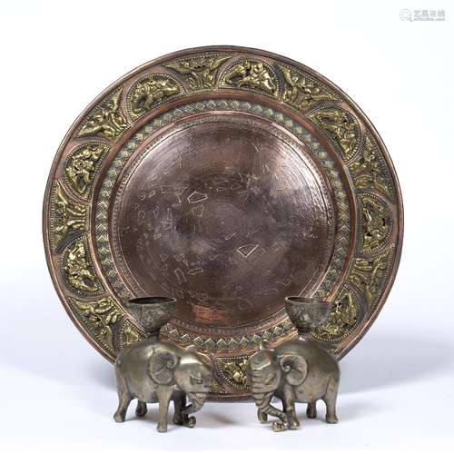 Copper plate Indian decorated to the border with repeating embossed decoration of elephants 23.5cm