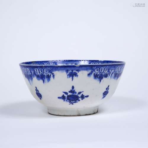 Safavid potterey bowl Persian,17th Century the centre with blue foliate spray, repeated to the