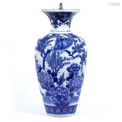 Blue and white porcelain ribbed vase Japanese, 19th Century painted with birds amongst foliage in