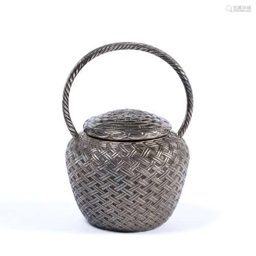 Silver model of a basket Japanese, 20th Century with stylised weaves around the basket, 215 grams