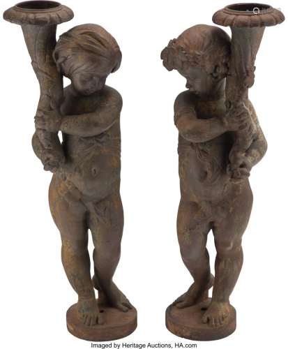 61175: A Pair of French Cast-Iron Figural Tor…