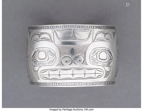 70229: A Haida Engraved Silver Bracelet c…