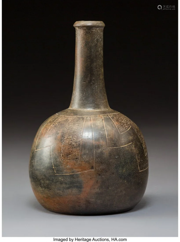 70676: A Chavin Incised Bottle Height: 8 ½ …