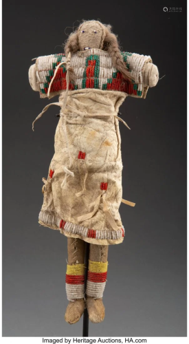 70406: A Plains Beaded Hide Doll c. 1890…