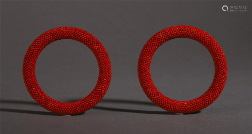 PAIR OF CHINESE CORAL BEAD BANGLES