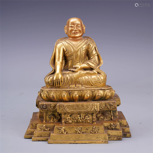 TIBETAN GILT BRONZE SEATED GURU