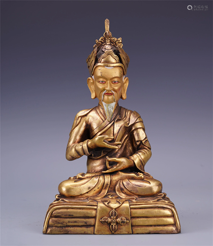 TIBETAN GILT BRONZE SEATED GURU