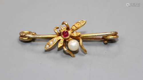 A late Victorian yellow metal ruby, cultured and seed pearl set bug brooch, 28mm, gross weight 1.6