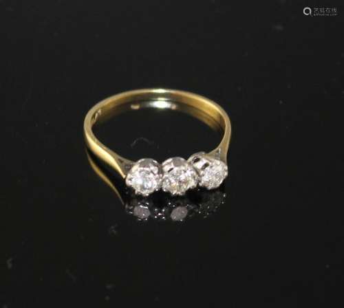 An 18ct and Plat, three stone diamond ring, size P, gross weight 1.8 grams, total diamond weight