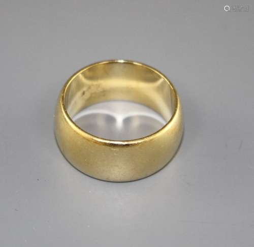 A 1970's 18ct gold wedding band, size M, 11.1 grams, Condition: Minor surface scratches in