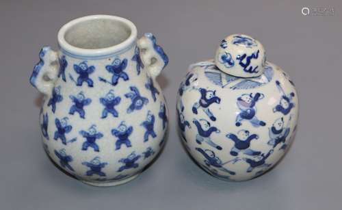 Two Chinese blue and white 'hundred boys' vases, larger 8cm. Condition: The cover does not match.