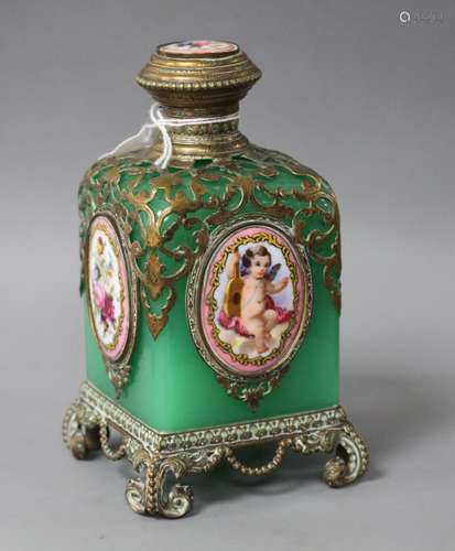 A 19th century French gilt metal mounted glass scent bottle, inset with painted and enamelled