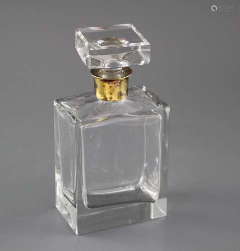 A 1970's silver gilt collared glass rectangular decanter and stopper, marks rubbed, London, 1974,