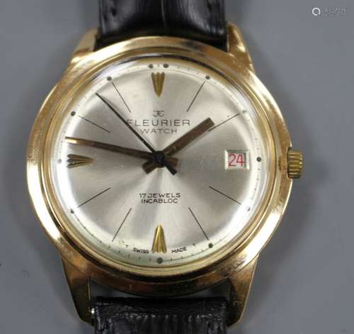 A gentleman's Swiss 18k yellow metal Fleurier automatic wrist watch, with baton numerals and date