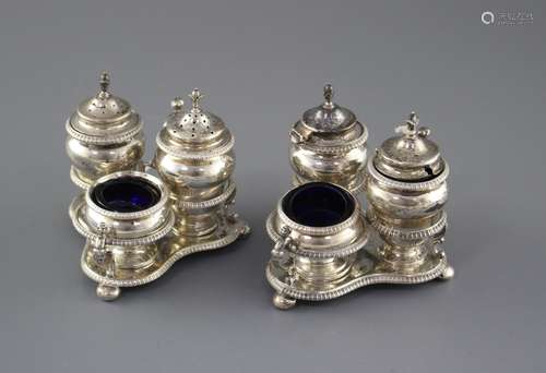 Two similar late 19th/early 20th century silver triform cruet stands by Horace Woodward & Co,