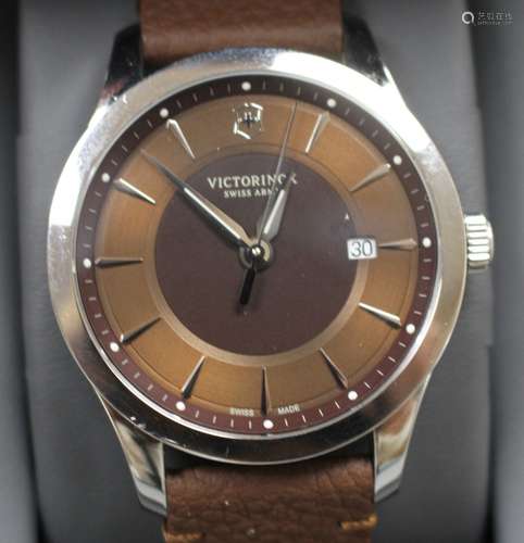 A gentleman's modern stainless steel Victorinox Swiss Army quartz wrist watch, with baton numerals