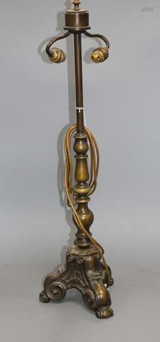 An early 20th century French bronze lamp base, lacks shade, height 71cm Condition: Rubbing to the