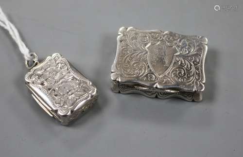 A Victorian silver shaped rectangular vinaigrette, Hilliard & Thomason, Birmingham, 1884 and one