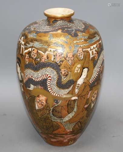 A Japanese Satsuma vase, decorated with a dragon and immortals, signed to the base, height 36cm