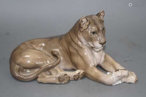 A Royal Copenhagen lioness, model no. 804, L. 31cm Condition: A bit grubby but in good condition,