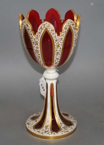 A 19th century Bohemian overlaid ruby glass goblet vase, height 32cm Condition: Broken completely