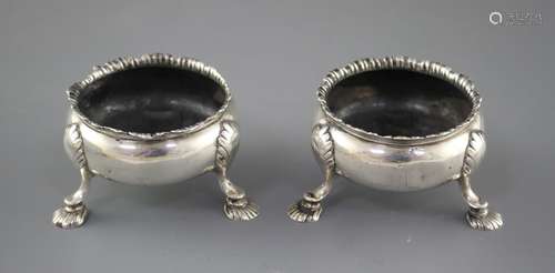 A pair of Georgian silver bun salts, circa, 1760-1780, (marks rubbed), diameter 65mm, 4.5oz.