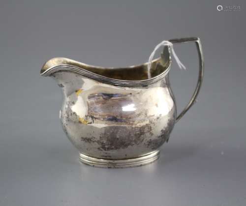 A George III silver helmet shaped cream jug, by Charles Hougham?, London, 1806, height, 85mm, 3oz.