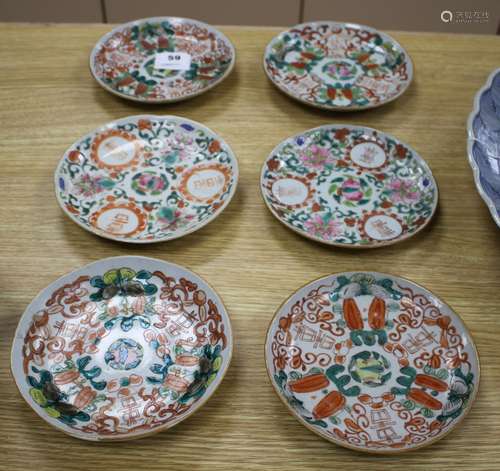 A near set of six 19th century Chinese famille rose saucer dishes, each painted with fruit and