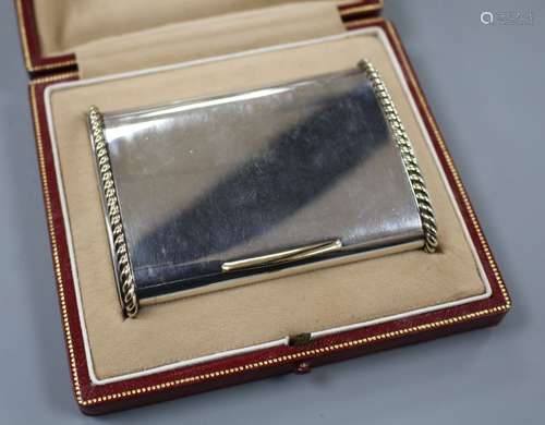 A George VI Cartier silver and yellow metal mounted cigarette case, in original fitted Cartier