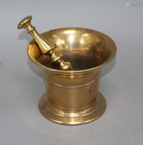 A 17th century style bronze pestle and mortar, height 12cm diameter 15.5cm, pestle 18cm Condition: