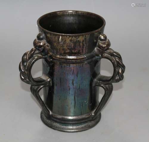 A Dickerware black lustre three handed tyg, early 20th century, indistinct impressed mark, height