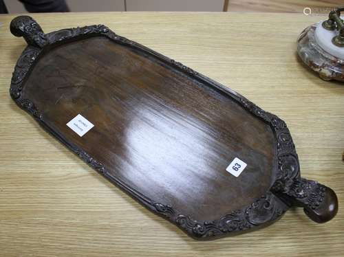 A Burmese carved hardwood tray, 70cm Condition: In good condition, minor scuffing to underside