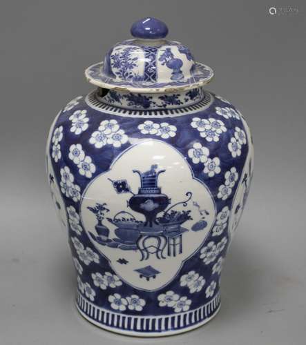 A 19th century Chinese blue and white jar, with panelled decoration, height 28cm and an associated