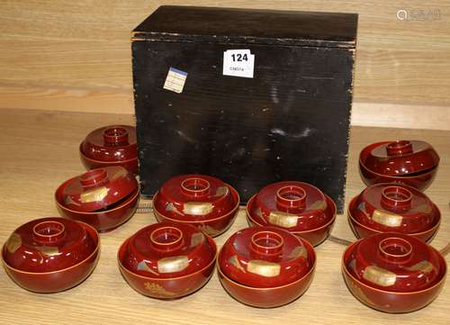 A set of ten Japanese lacquer rice bowls and covers, with fitted box, Meiji / Taisho period, each