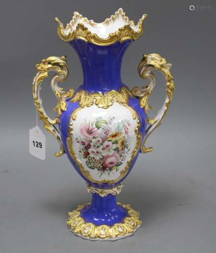 A Victorian porcelain vase, painted with panels of garden flowers, height 35cm Condition: Minor