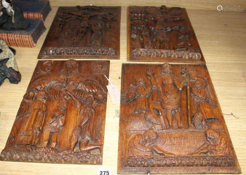 A set of four 19th century Continental relief carved oak religious plaques, depicting biblical