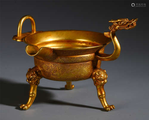 A FINE CHINESE GILT BRONZE CARVED BEAST PATTERN LIBATION CUP