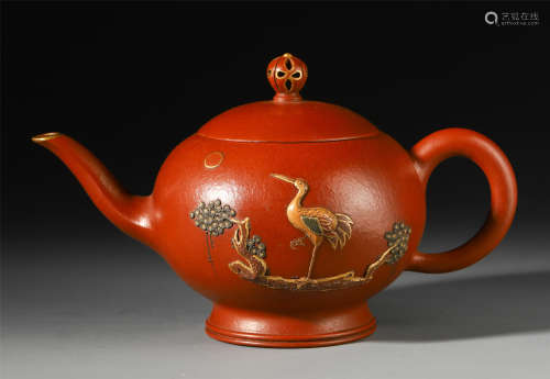 A CHINESE YIXING ZISHA CLAY INLAID GILT CARVED TEA POT