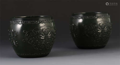 A PAIR OF CHINESE SPINACH JADE CARVED FLOWER CUPS